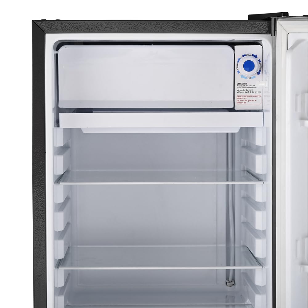 Empty refrigerator with open door on a white background