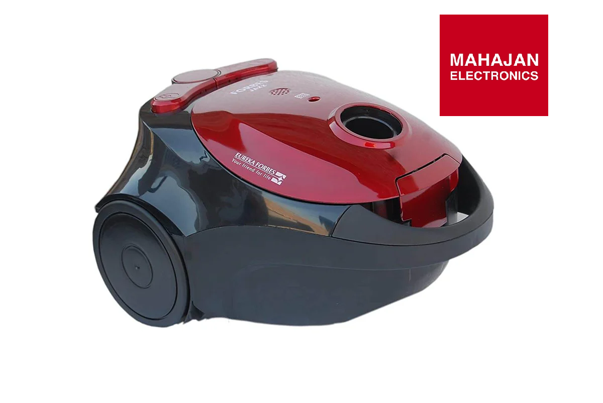 Red and black vacuum cleaner with Mahajan Electronics logo on a white background