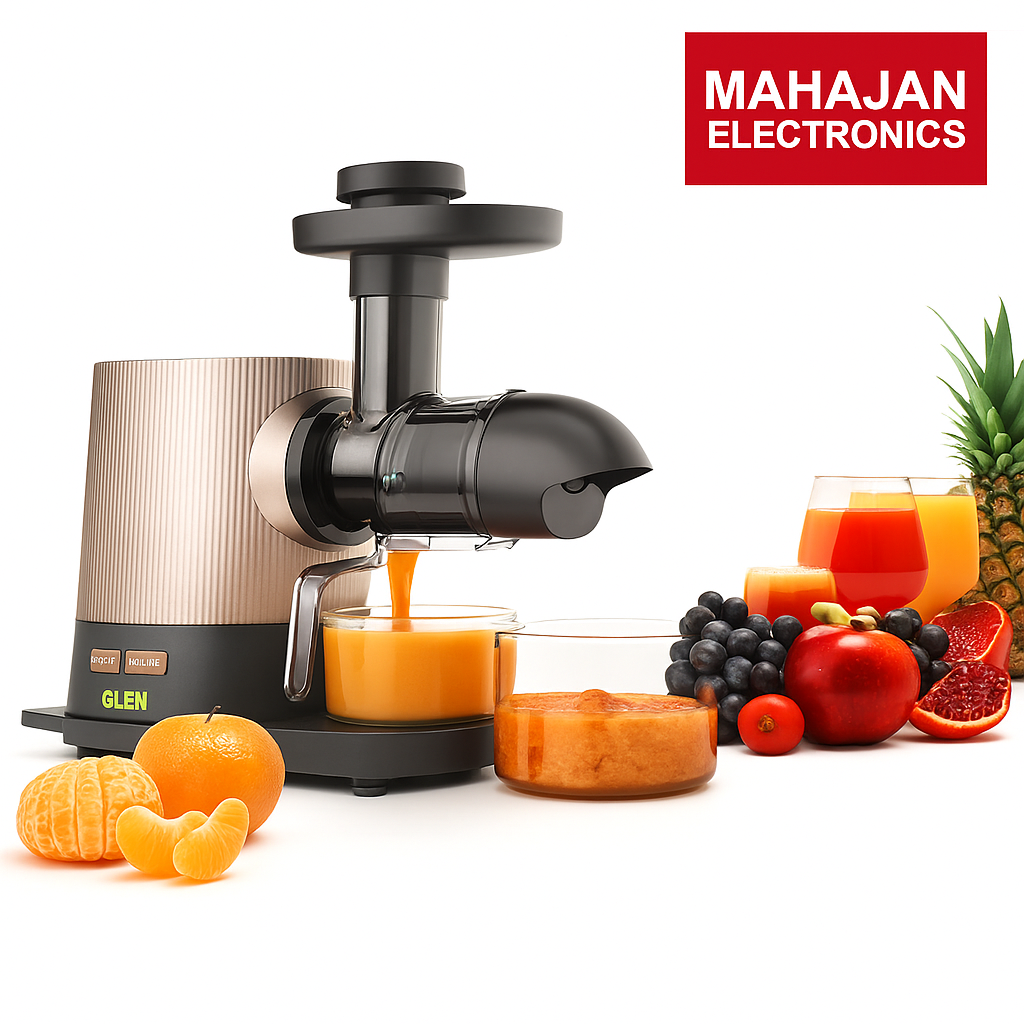 Juicer with fresh fruits and juice, featuring Mahajan Electronics logo.