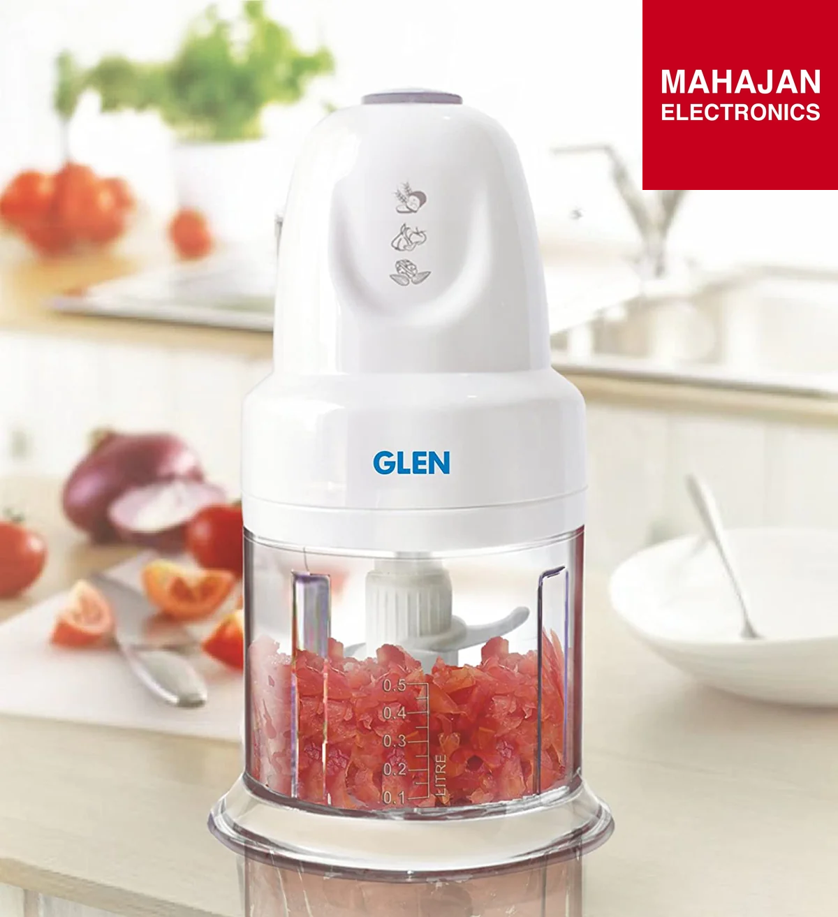 Glen blender with chopped tomatoes on a kitchen counter, branded by Mahajan Electronics.