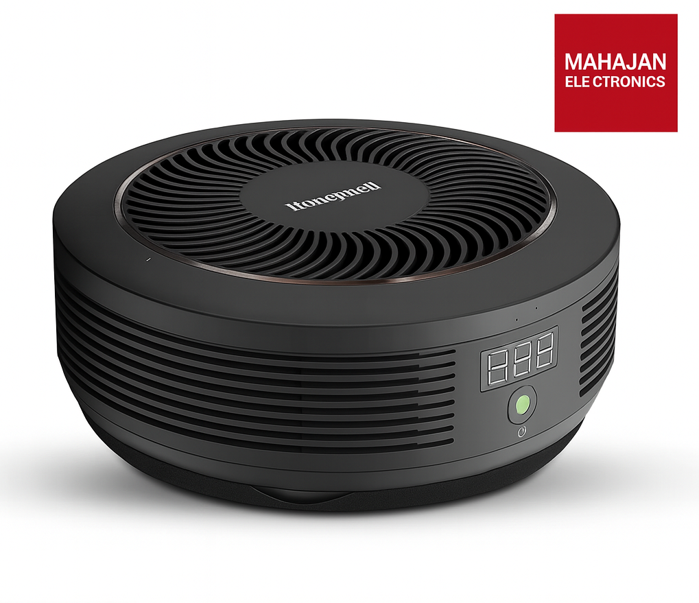 Black air purifier with digital display on a white background, featuring the Mahajan Electronics logo.