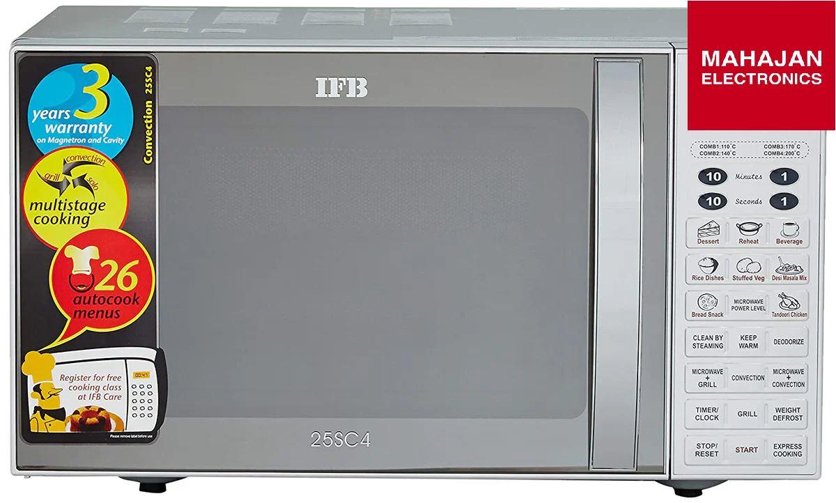 IFB microwave oven with warranty stickers and Mahajan Electronics branding.