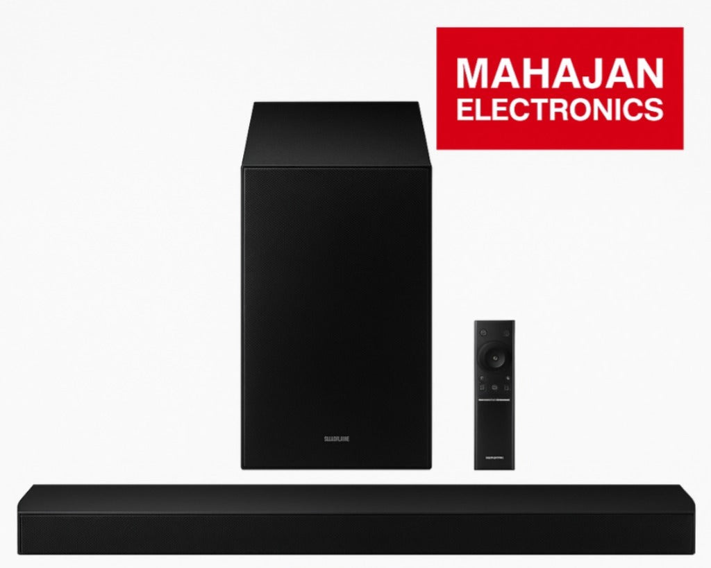 Black audio system with a remote control on a white background, featuring the Mahajan Electronics logo.