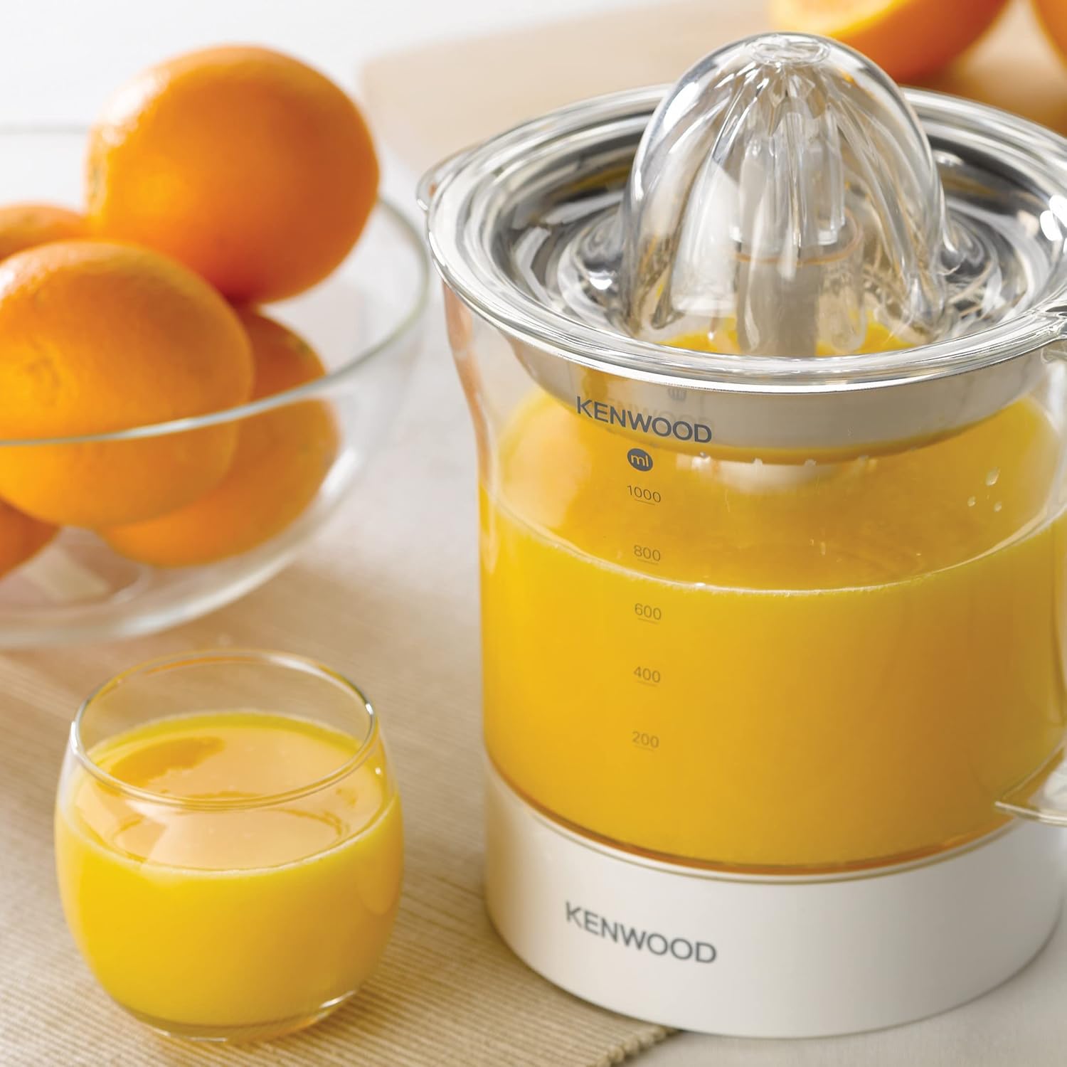 Kenwood JE290A Electric Citrus Juicer, 1 Litre Capacity, 40 Watts, Automatic Juice Extractor for Citrus Fruits, Stainless Steel Filter, 2 Way Rotation, Portable Fruit Squeezer, Transparent Jar, White Mahajan Electronics Online