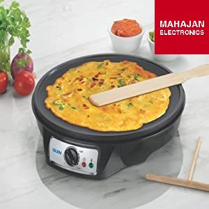Electric griddle with a cooked omelette on a marble surface, featuring Mahajan Electronics branding.