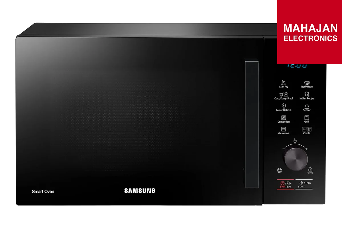 Samsung microwave oven with control panel on a white background, featuring the Mahajan Electronics logo.